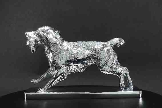 Spaniel running with bird Car Bonnet Mascot Hood Ornament